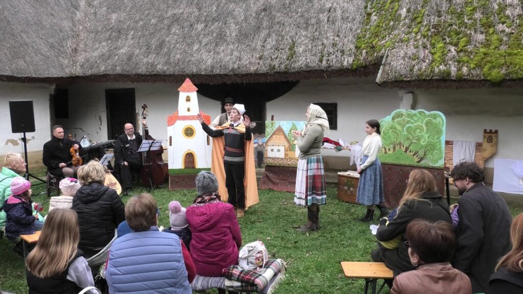 Márton atya, hosszú vonakodás után megadja magát és elvállalja a püspöki kinevezést majd megáldja az embereket.